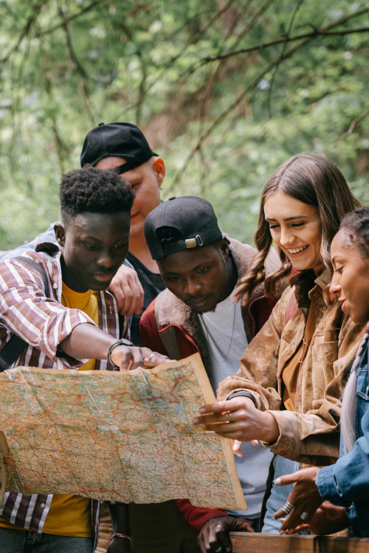 Travelers reading a map together
